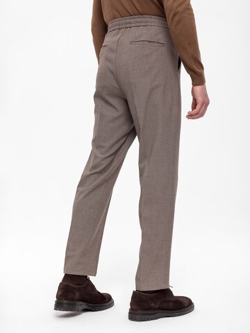 Antioch Tapered Trousers with creases in Beige