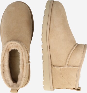 UGG Talvisaappaat 'Classic Ultra Mini' värissä ruskea