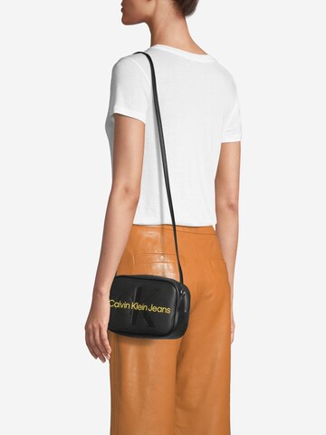 Sac à bandoulière Calvin Klein Jeans en noir