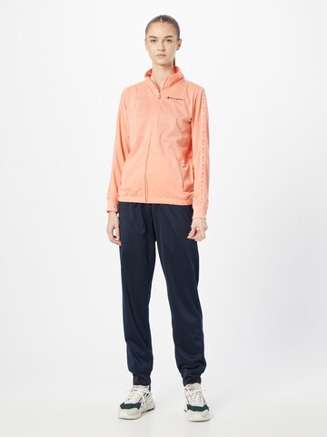 Champion Authentic Athletic Apparel Trainingspak in Oranje: voorkant