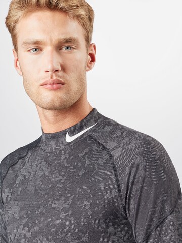 NIKE Regular fit Functioneel shirt in Grijs