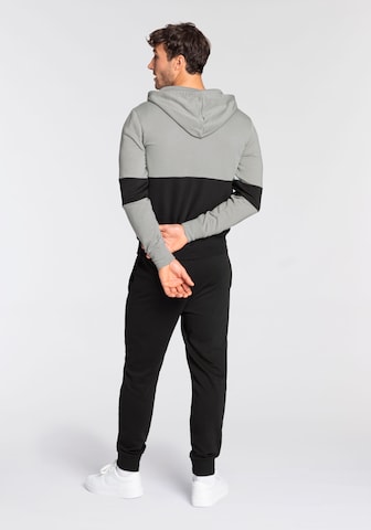 Champion Authentic Athletic Apparel Tracksuit in Black