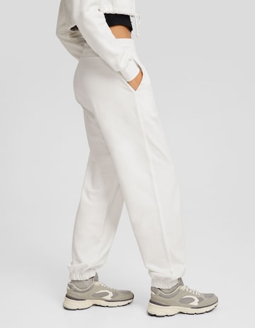 Bershka Tapered Trousers in White
