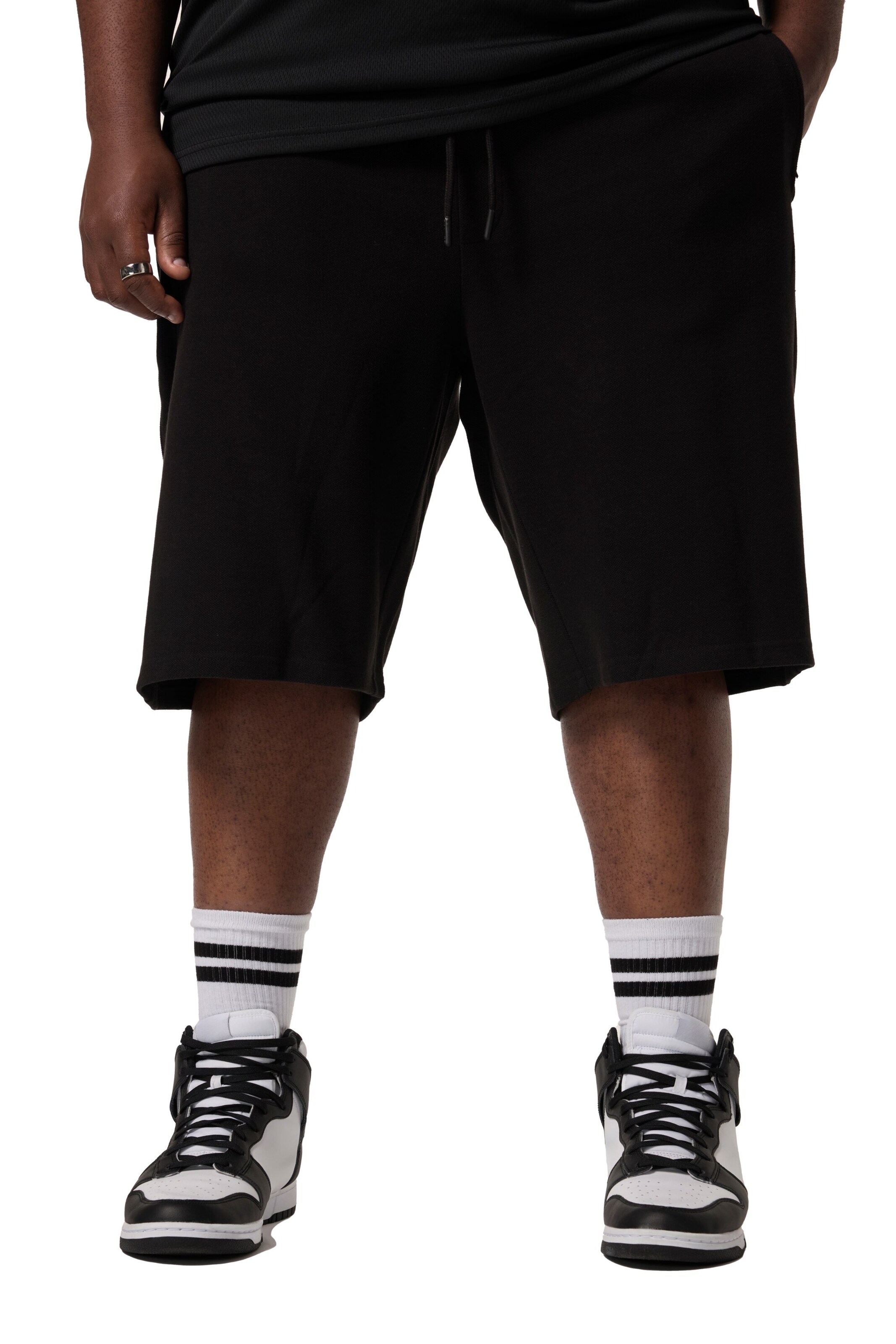 STHUGE Regular Trousers in Black: front