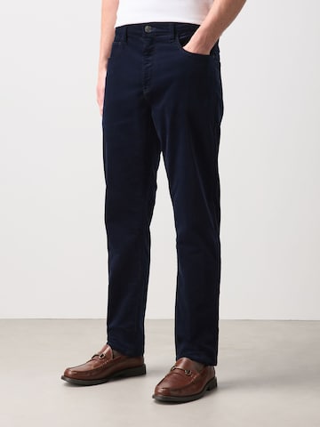Next Slim fit Trousers 'Motionflex' in Blue: front