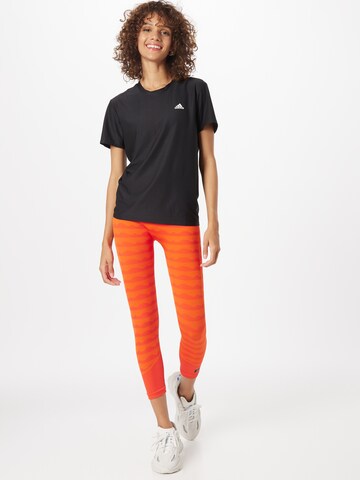 ADIDAS SPORTSWEAR Skinny Sporthose 'Marimekko Aero' in Orange