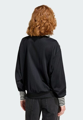 ADIDAS ORIGINALS - Sudadera con cremallera en negro