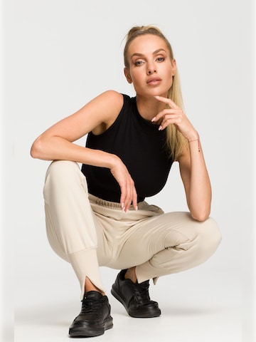 made of emotion Slimfit Hose in Beige