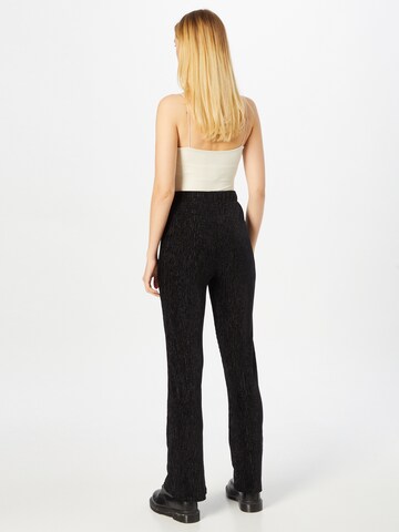 ABOUT YOU Flared Broek 'Chiara' in Zwart