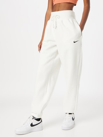 Loosefit Pantaloni de la Nike Sportswear pe bej: față