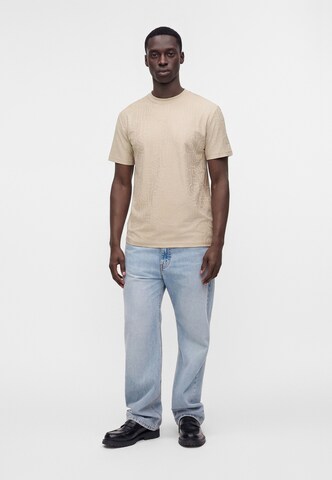 Maglietta di GUESS in beige