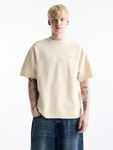 Tricou de la Pull&Bear pe bej: față