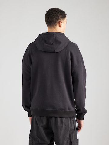 ELLESSE - Sweatshirt em preto