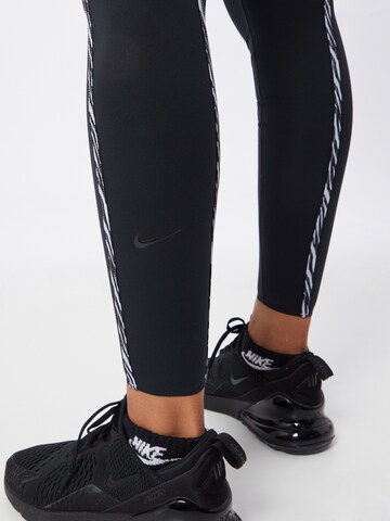 NIKE Skinny Sporthose 'One Luxe' in Schwarz