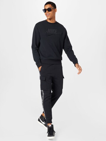 Nike Sportswear Zwężany krój Bojówki w kolorze czarny