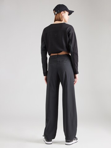 Champion Authentic Athletic Apparel - Pierna ancha Pantalón en negro