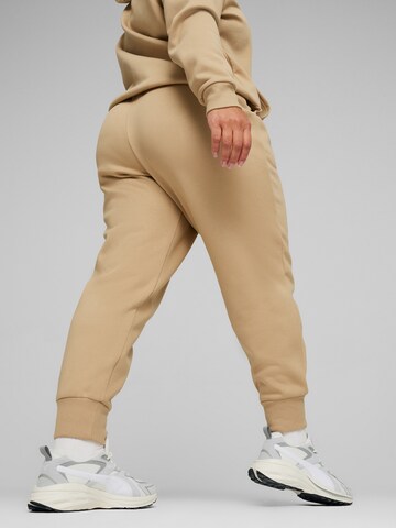 PUMA Tapered Sports trousers 'Essentials' in Brown