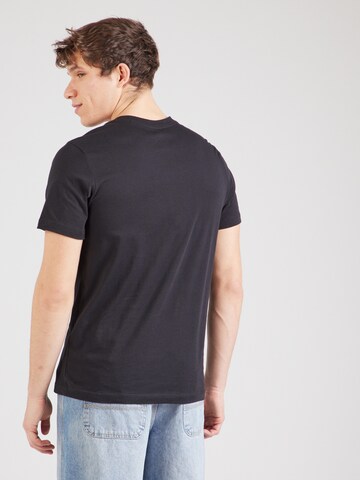 Nike Sportswear - Camisa em preto