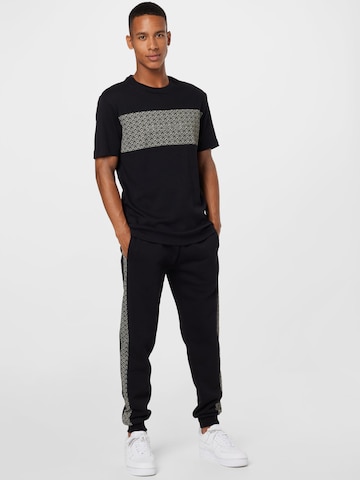 River Island Tapered Παντελόνι σε μαύρο