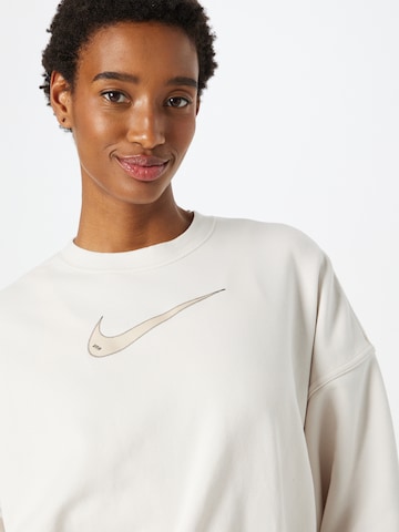 Nike Sportswear Sweatshirt 'Swoosh' in Beige