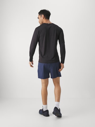 Loosefit Pantalon de sport new balance en bleu