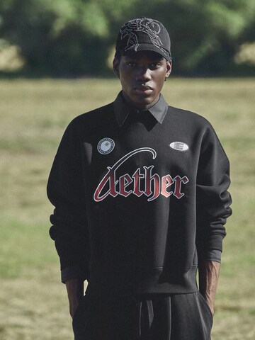 Sweat-shirt 'LETHER' Bershka en noir : devant