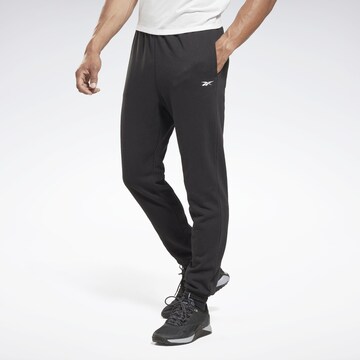 Reebok Tapered Workout Pants in Black: front