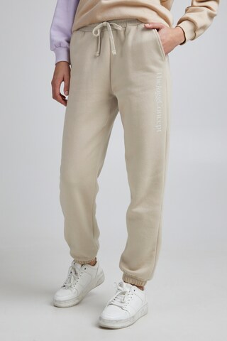 The Jogg Concept Tapered Trousers in Beige: front