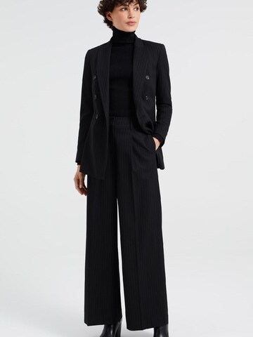 regular Pantaloni con piega frontale di WE Fashion in nero