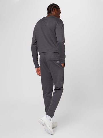 BIDI BADU Tapered Sportbroek in Grijs