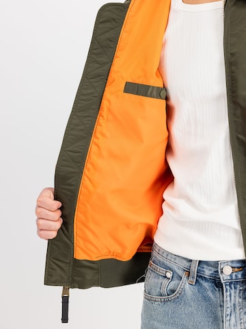 ALPHA INDUSTRIES Between-Season Jacket 'Flying Tigers' in Green