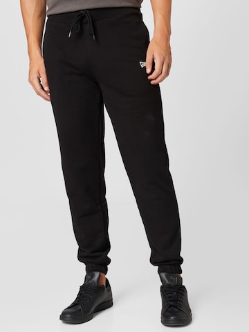 NEW ERA Tapered Pants in Black: front