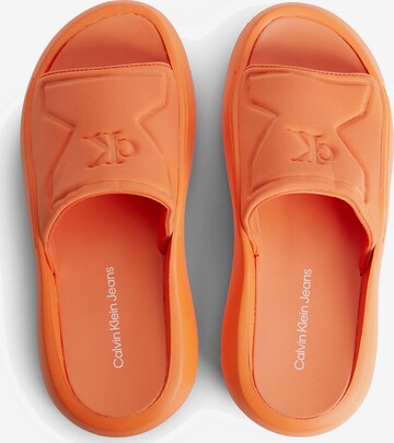 Calvin Klein Jeans Mules in Orange