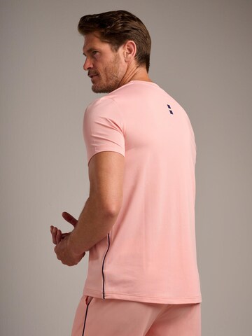nordicdots Performance shirt 'Performance V-Tee' in Orange