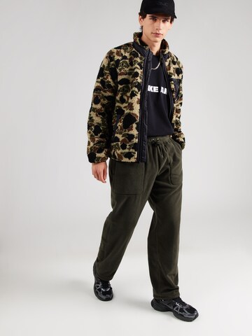 Nike Sportswear Loosefit Byxa 'CLUB' i grön