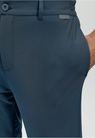 Born Living Yoga Regular Broek 'Cannon' in Blauw