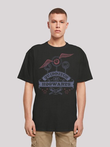 F4NT4STIC T-Shirt 'Harry Potter Quidditch At Hogwarts' in Schwarz: Vorderseite