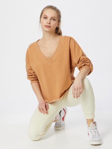 NIKE Sport sweatshirt i orange