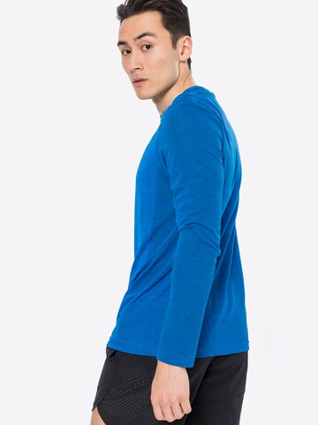 T-Shirt fonctionnel UNDER ARMOUR en bleu