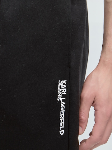 KARL LAGERFELD JEANS Tapered Housut värissä musta