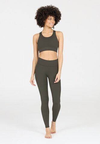 Athlecia Skinny Sportbroek 'Luxe' in Bruin