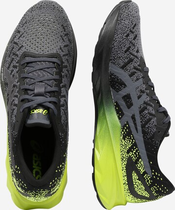 Chaussure de sport 'DYNABLAST' ASICS en noir