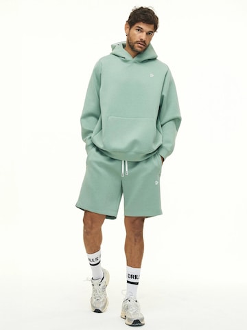 regular Pantaloni 'RECREATION Scuba Shorts' di DRILLS Apparel in verde
