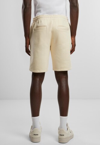 Regular Pantalon Karl Kani en beige