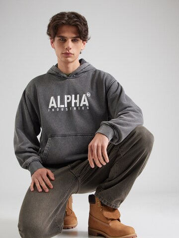 ALPHA INDUSTRIES Sweatshirt 'Stencil' i svart: framsida