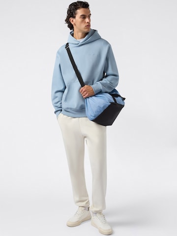 Champion Authentic Athletic Apparel Sweatshirt i blå