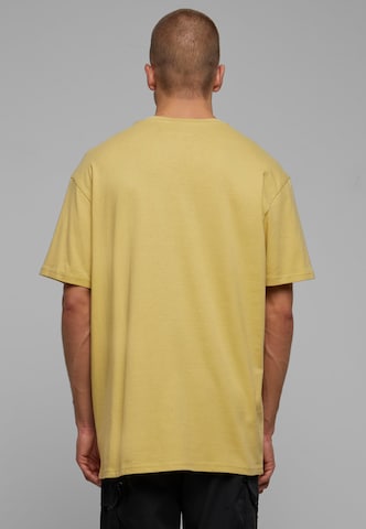 MT Upscale Koszulka 'Hate it or Love it' w kolorze żółty