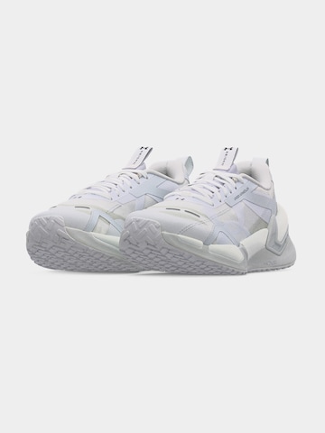 Chaussure de sport 'Reign XT' UNDER ARMOUR en blanc
