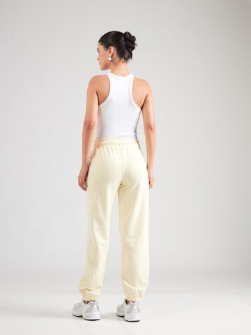 ELLESSE Tapered Pants 'LENTELLA' in Yellow