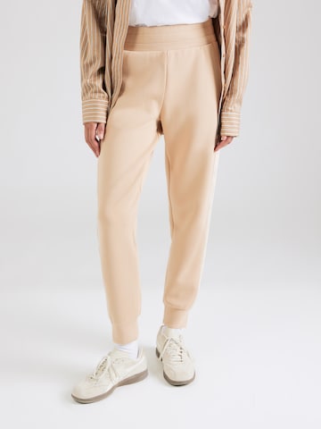 Tapered Pantaloni di GUESS in beige: frontale